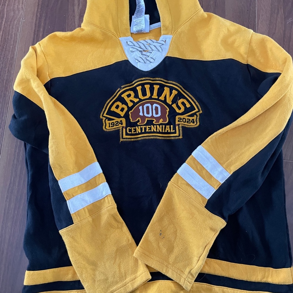 Reebok Bruins Centennial Hoodie. Spots on one sleeve.